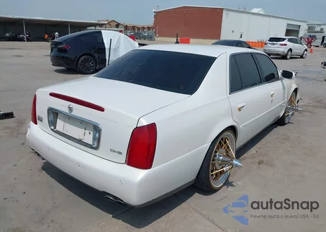 2004 Cadillac Deville Dhs z USA, uszkodzony, nr VIN 1G6KE57Y64U256745